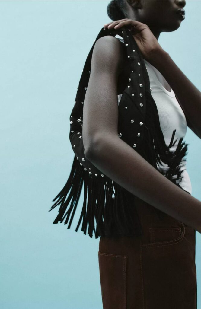 oval studded fringed bag