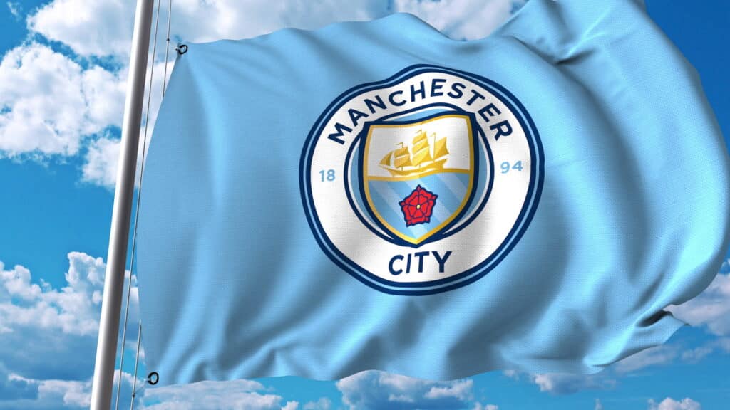 Waving flag with Manchester City football team logo. Editorial 3D