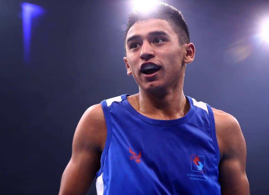 HAMBURG, GERMANY - AUGUST 31:  Ikboljon Kholdarov of Uzbekistan fights in the Men's light welter during the semi finals of the AIBA World Boxing Championships Hamburg 2017 at Sporthalle Hamburg on August 31, 2017 in Hamburg, Germany.  (Photo by Martin Rose/Bongarts/Getty Images)