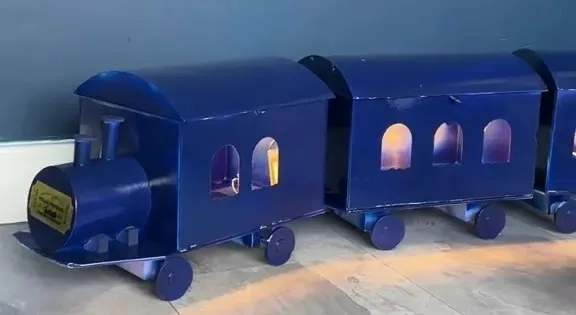 Woman Transforms £240 P. Louise Advent Calendar into Polar Express Train