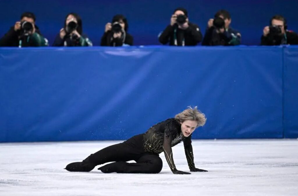 USA's Ilia Malinin falls while competing in the figure skating men's singles free skating final during the Milano Cortina 2026 Winter Olympic Games at Milano Ice Skating Arena in Milan on February 13, 2026. 