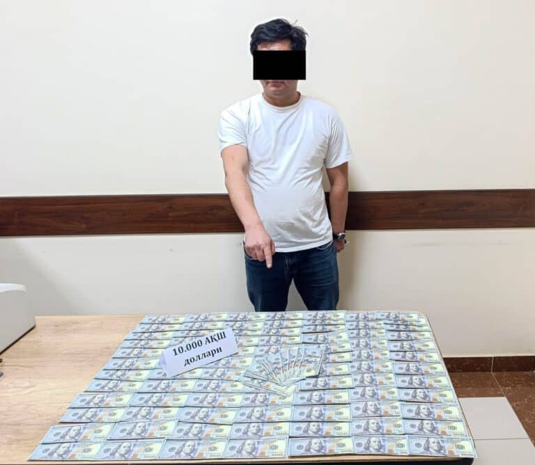 Qibray tumanida hokim yordamchisi 10 ming dollar bilan ushlandi